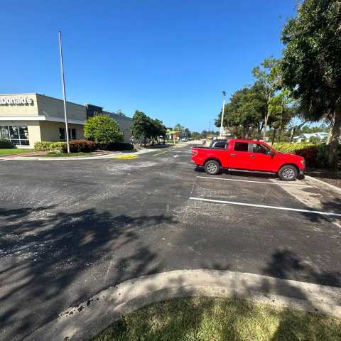 Newly paved commercial parking lot, project photo 38