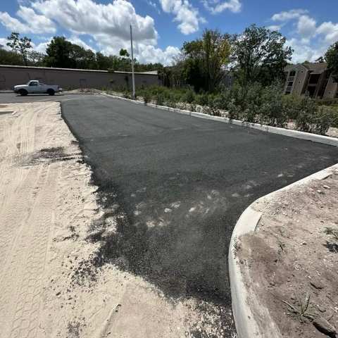 Newly paved commercial parking lot, project photo 65
